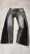 Jeans flare borchie