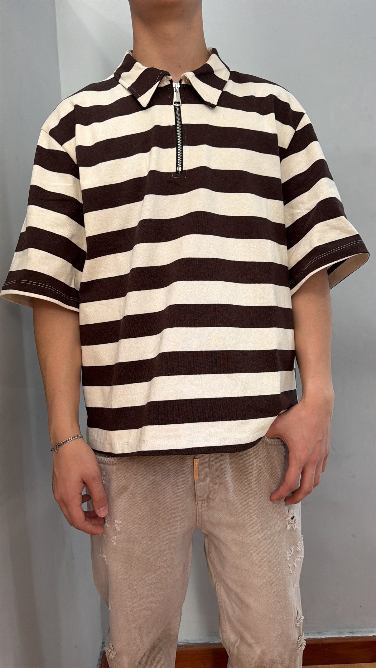 Polo righe zip
