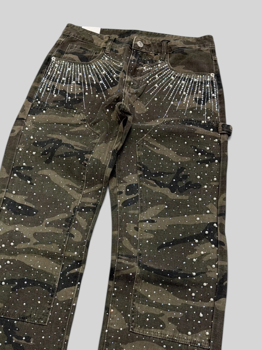 Jeans mimetico borchie