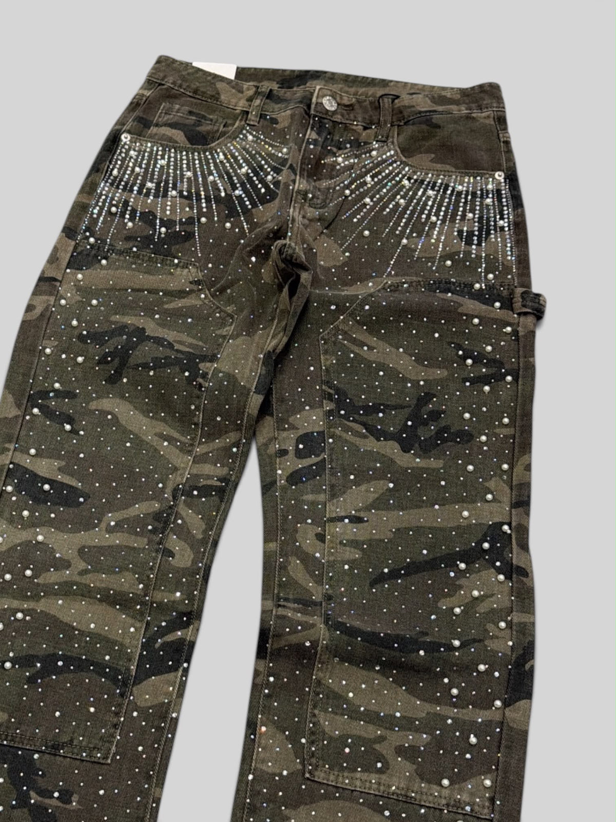 Jeans mimetico borchie