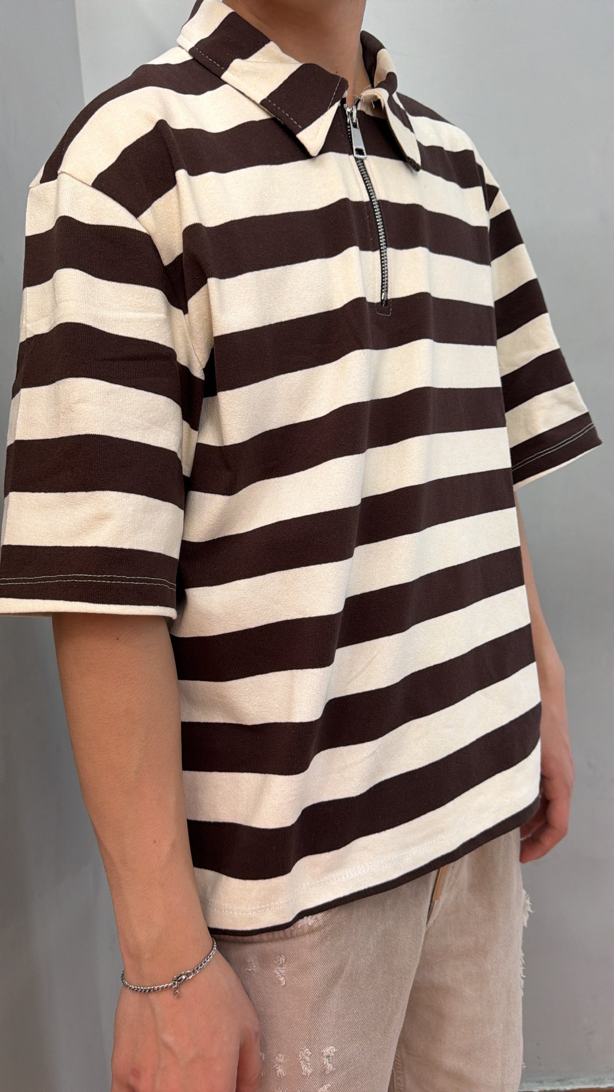 Polo righe zip